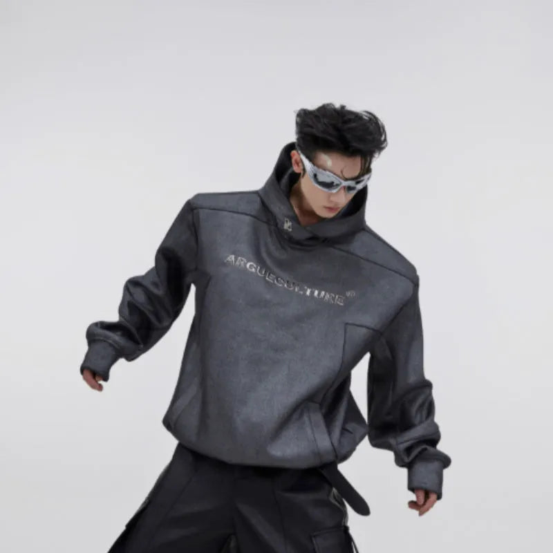 Men's red hooded sweater with heavy shoulder pads and raised silver metal 3D printing on the front.