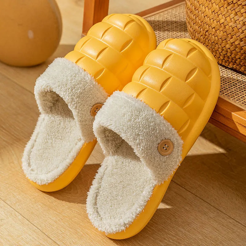 Plaid patterned EVA detachable slippers with plush lining, shown in pink, on a plain background.