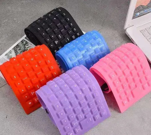 85-key wired silicone mute keyboard in black blue pink purple with USB cable