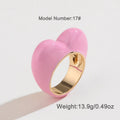 Zinc alloy heart-shaped ring with raised three-dimensional enamel colour detailing in love motif design