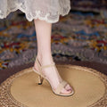 Women's one-strap low heel cat heel sandals in solid apricot colour with PU leather upper and rubber sole