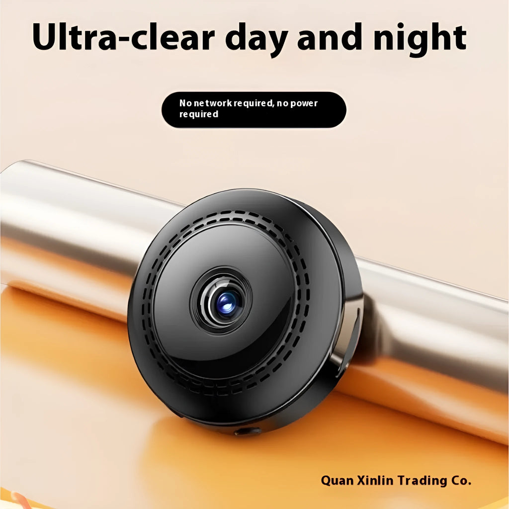 Wireless security camera with 360-degree rotation on a black stand showing HD night vision capability