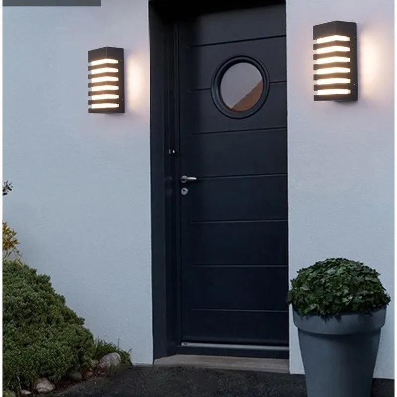 Modern aluminium outdoor wall lamp with minimalist design for garden or patio installation
