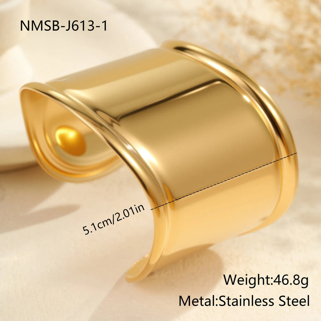Women's exaggerated wide gold-plated bracelet with wave geometric design and niche opening