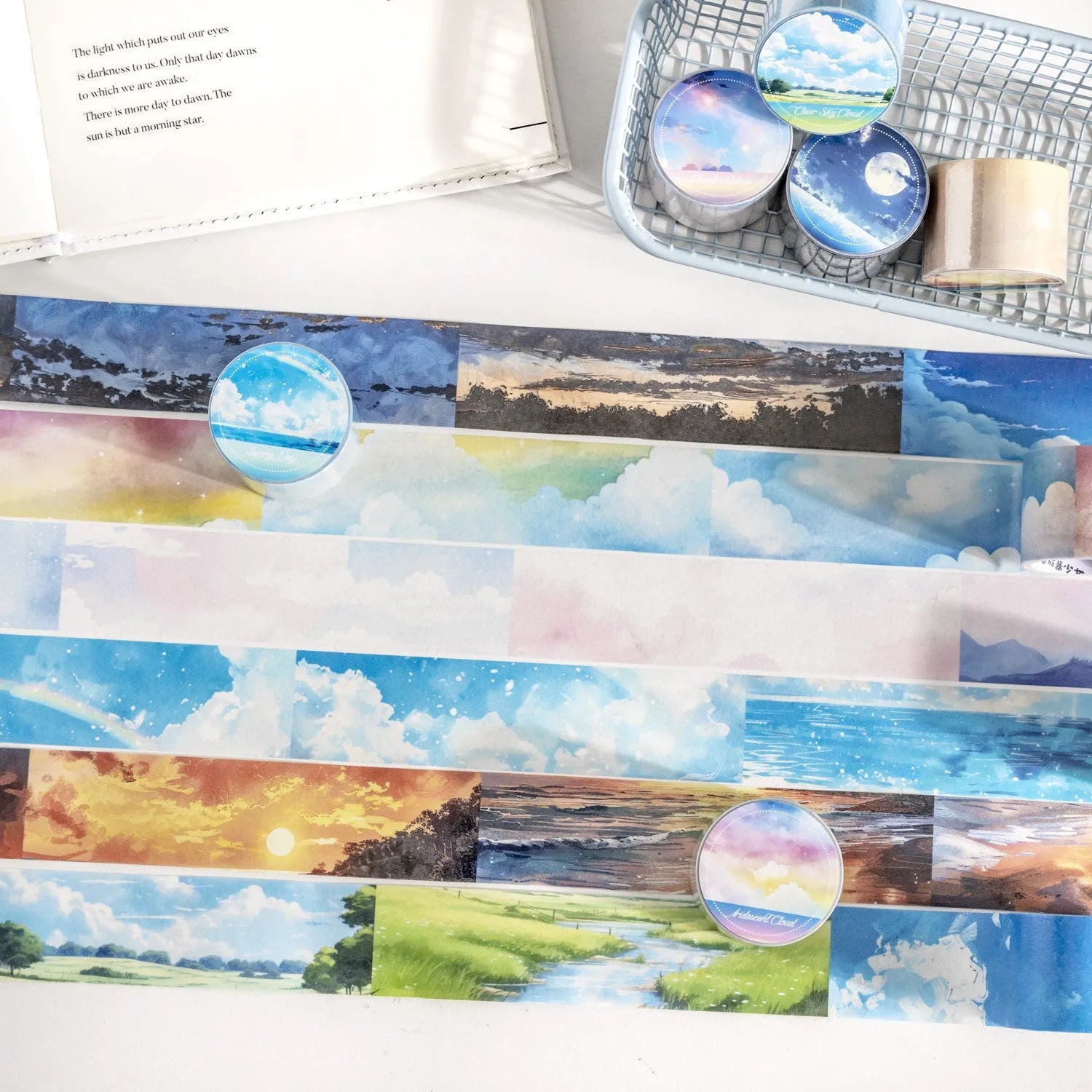 Roll of Japanese paper decorative tape with sky theme designs including clouds and nebula patterns