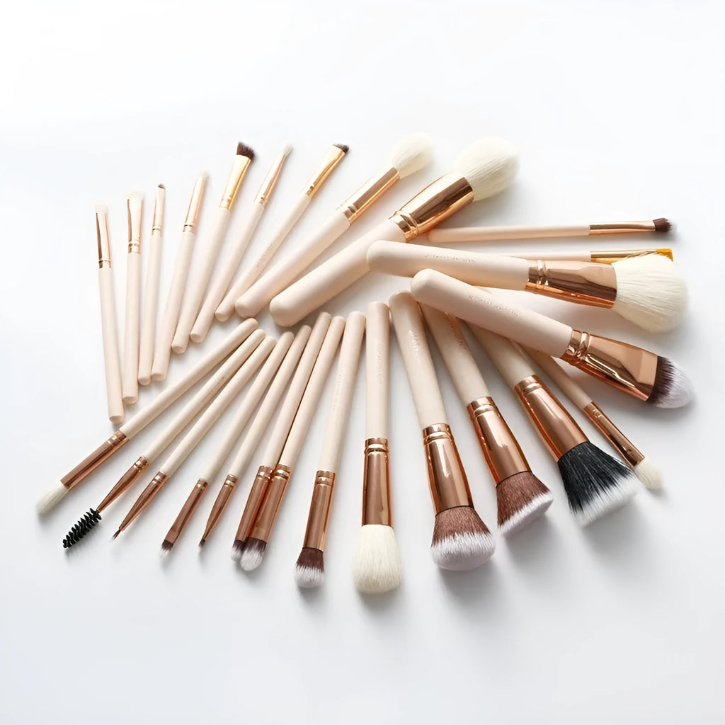 Pink 26-piece makeup brush set with wooden handles displayed in a PU storage bag.