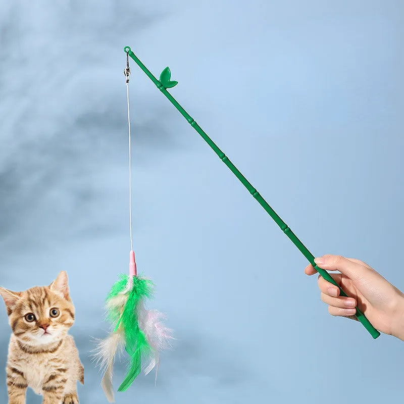 Green interactive cat feather wand toy with bells for play and training