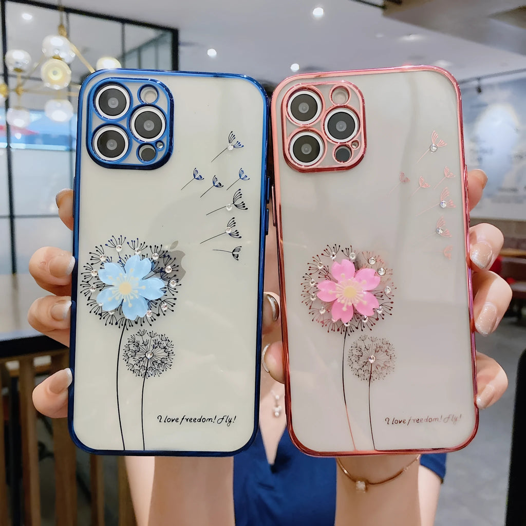 Green silicone iPhone case with a 3D spinning pink flower decoration on the back.