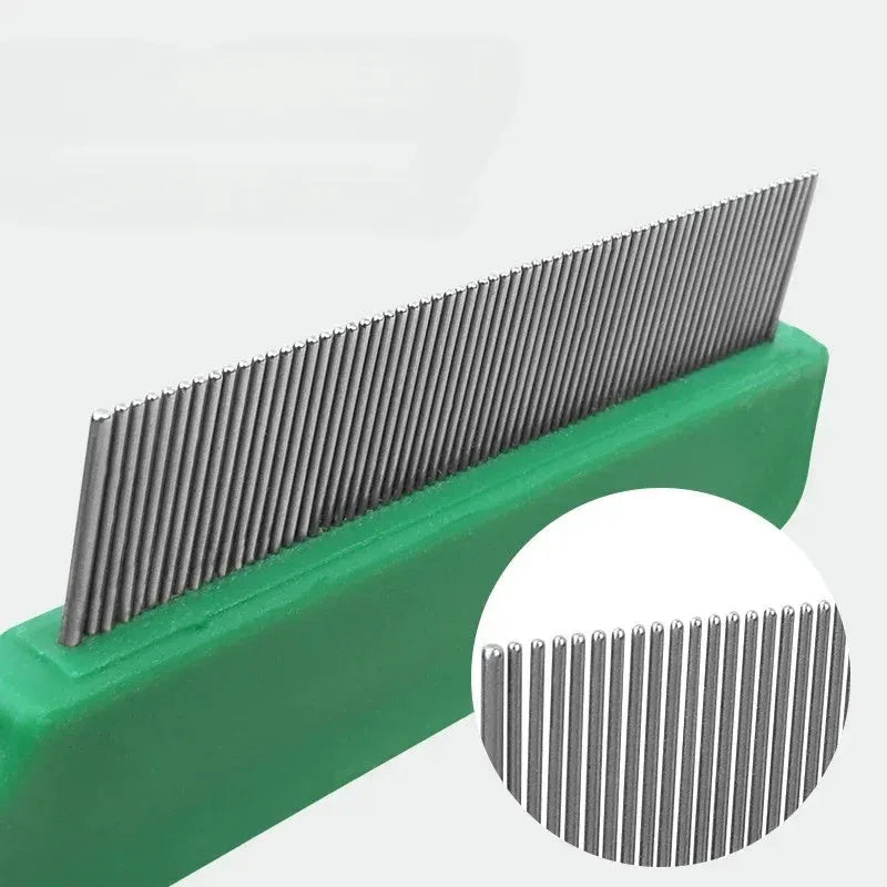Green pet flea comb with stainless steel pins and plastic handle for dog and cat grooming