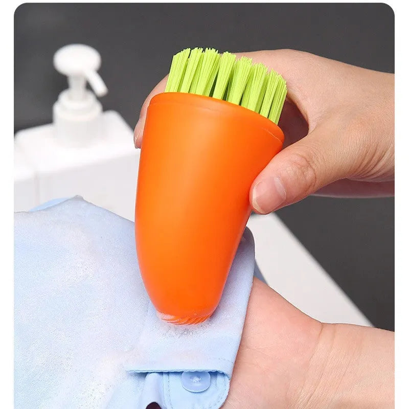 Orange and white carrot-shaped nylon vegetable cleaning brush for scrubbing potatoes