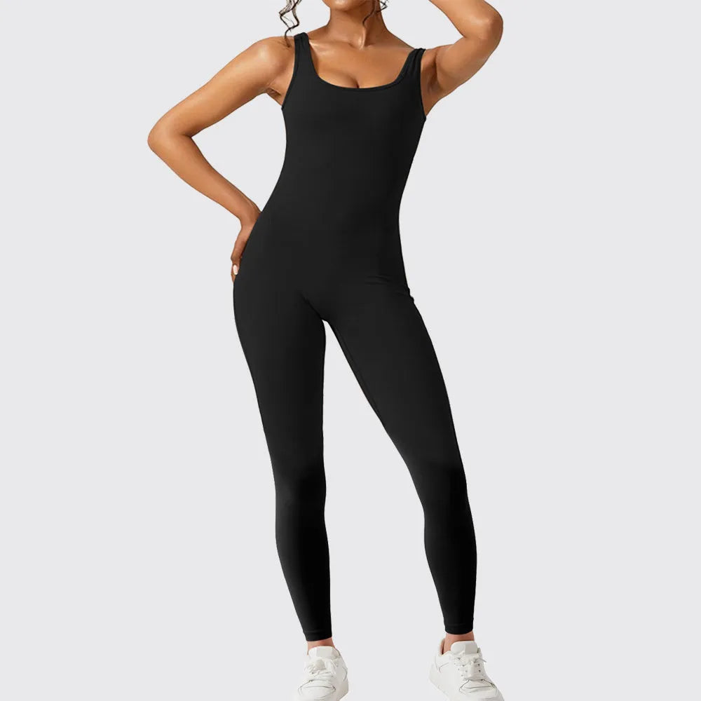 Women's sleeveless flare leg jumpsuit for yoga in high-elasticity polyester fabric.