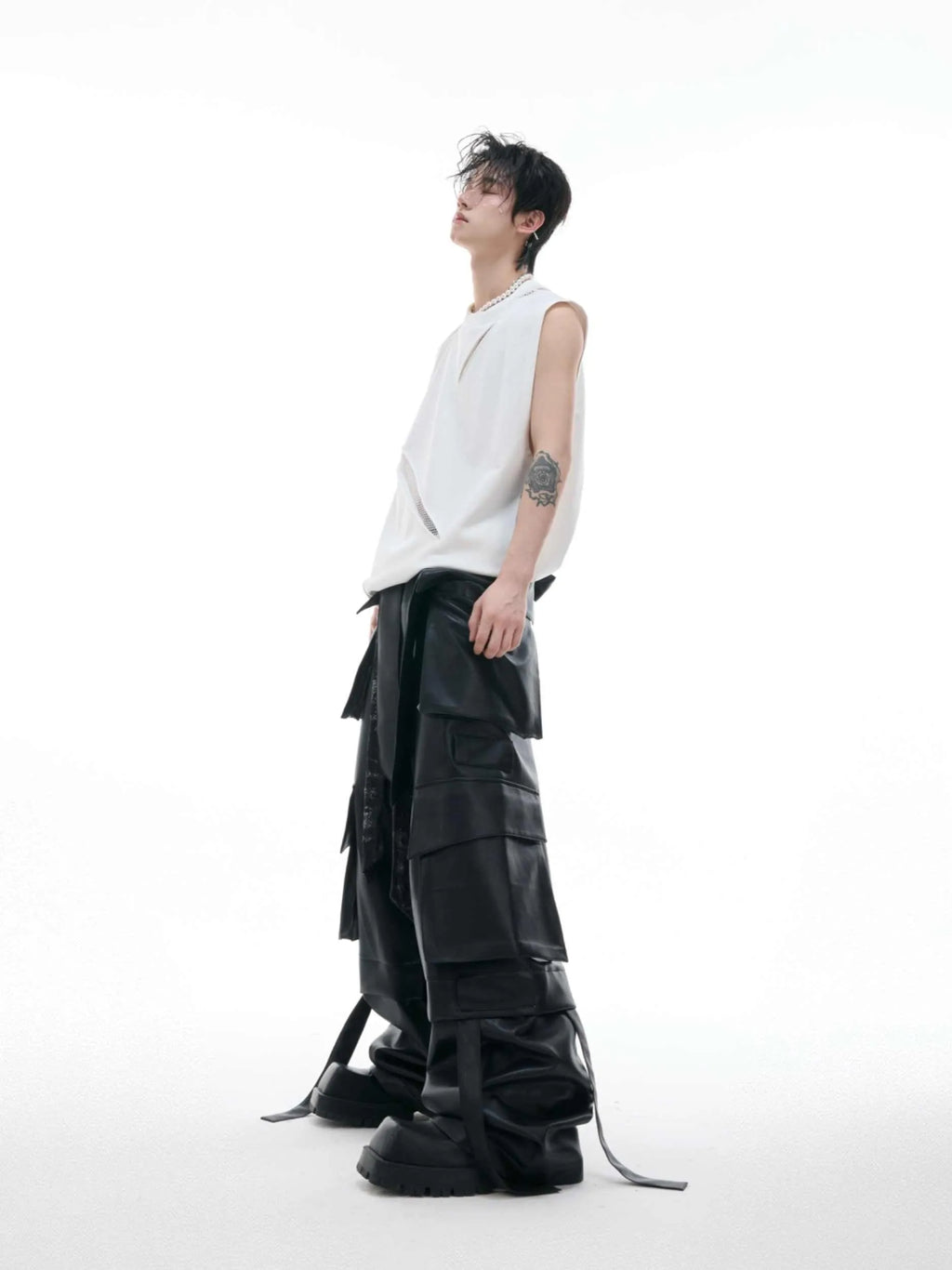 Niche 3D cutting hollow mesh sleeveless vest in black slim fit with metal decoration