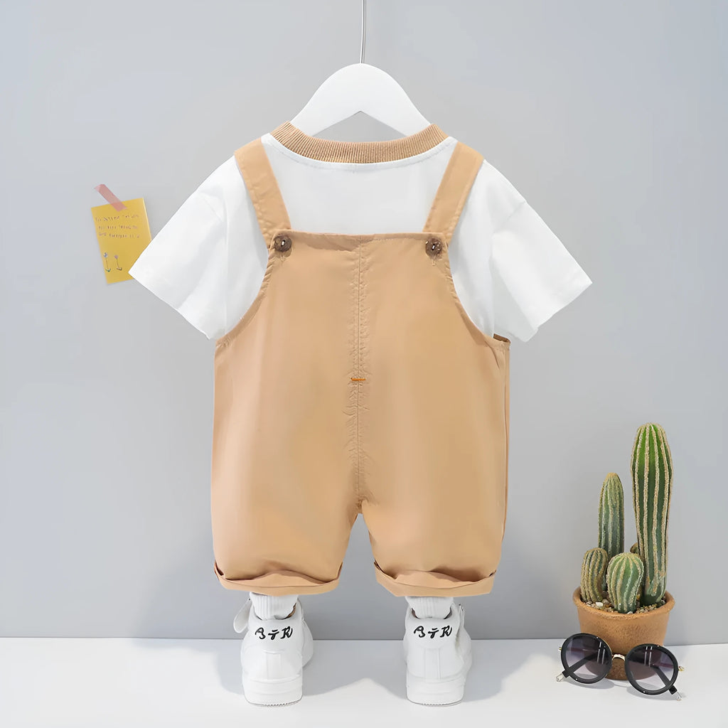 Yellow cotton baby cartoon short-sleeved overalls with strap design on a hanger