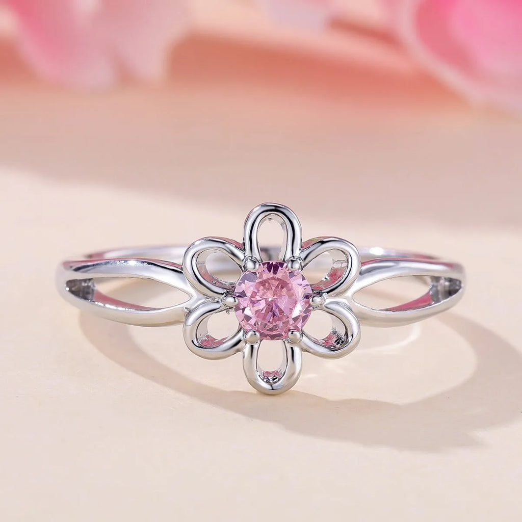 Women's hollow flower design ring in platinum pink diamond colour with white gold powder accents