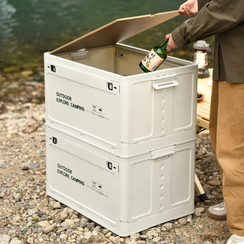 Large white foldable plastic storage box with a wooden lid for household organisation.