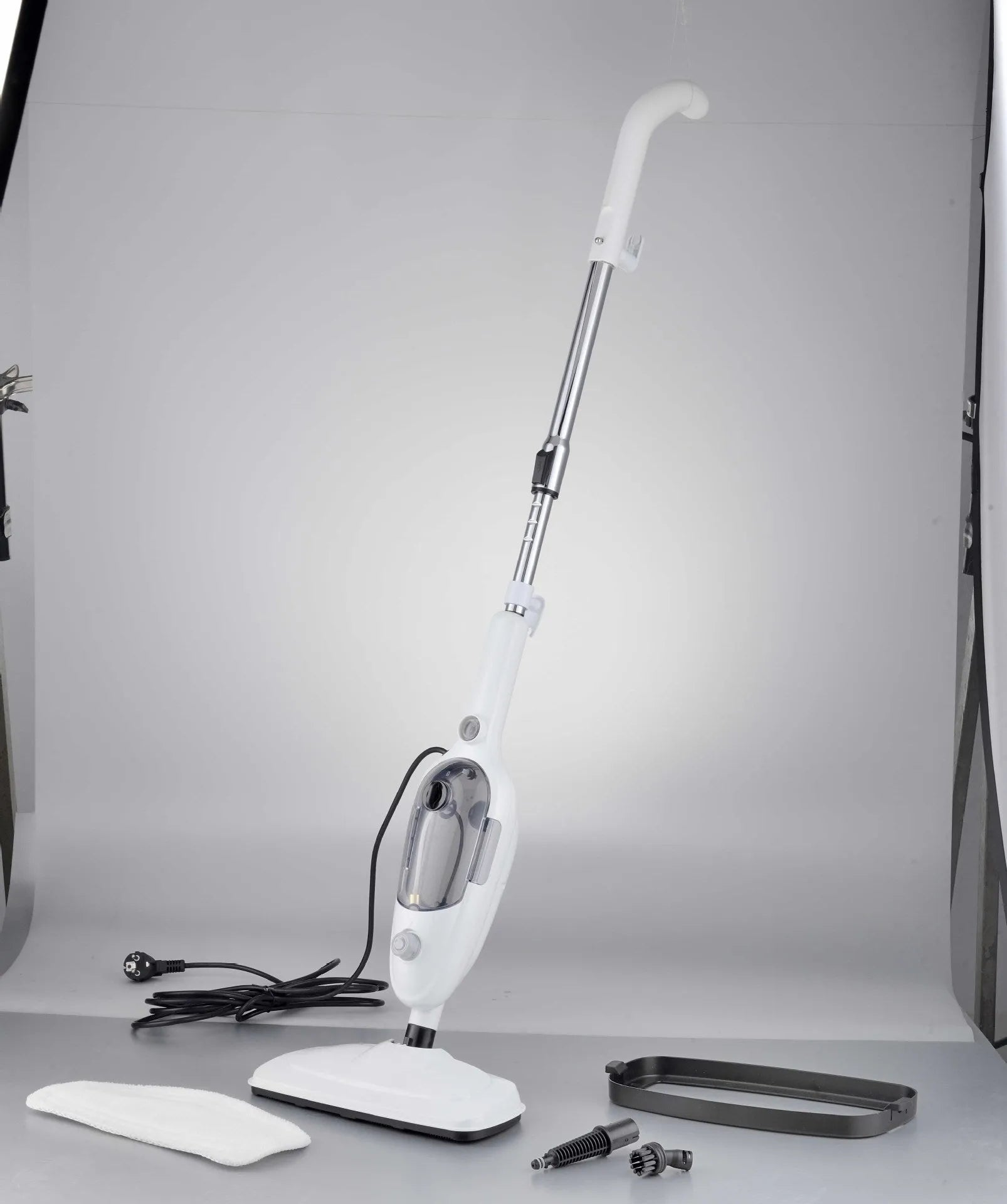 White steam mop with rectangular chassis, 1300W power, 10-in-1 cleaning accessories set, and carpet glider for hard floor cleaning