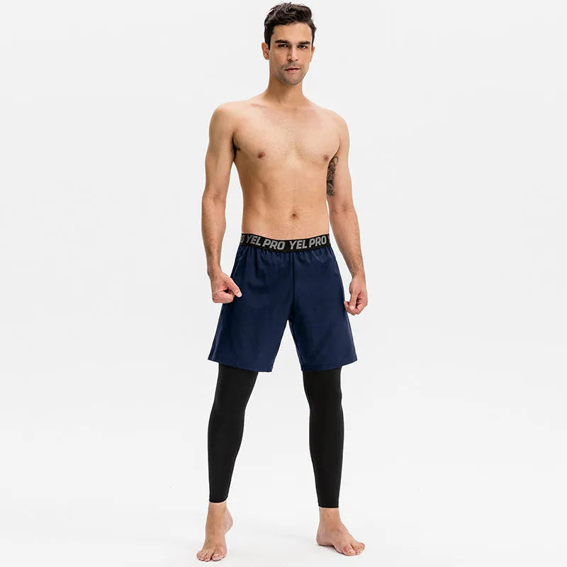 Man wearing grey quick-drying high elastic tight fitness pants for running or gym workout.