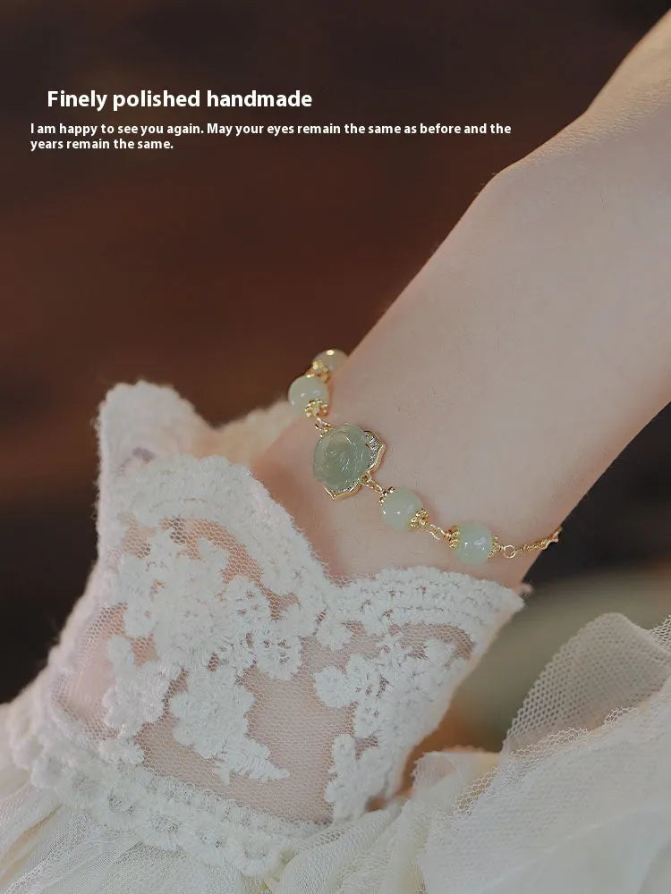 Original design women's bracelet in Hetian jade rose with 14K gilding and a flower shape.