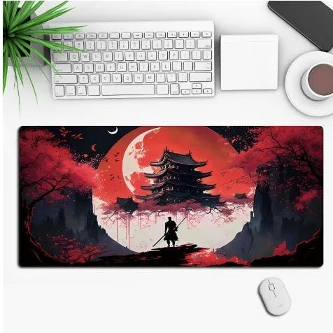 Large black gaming mouse pad with an anime character print, lying flat on a wooden desk.