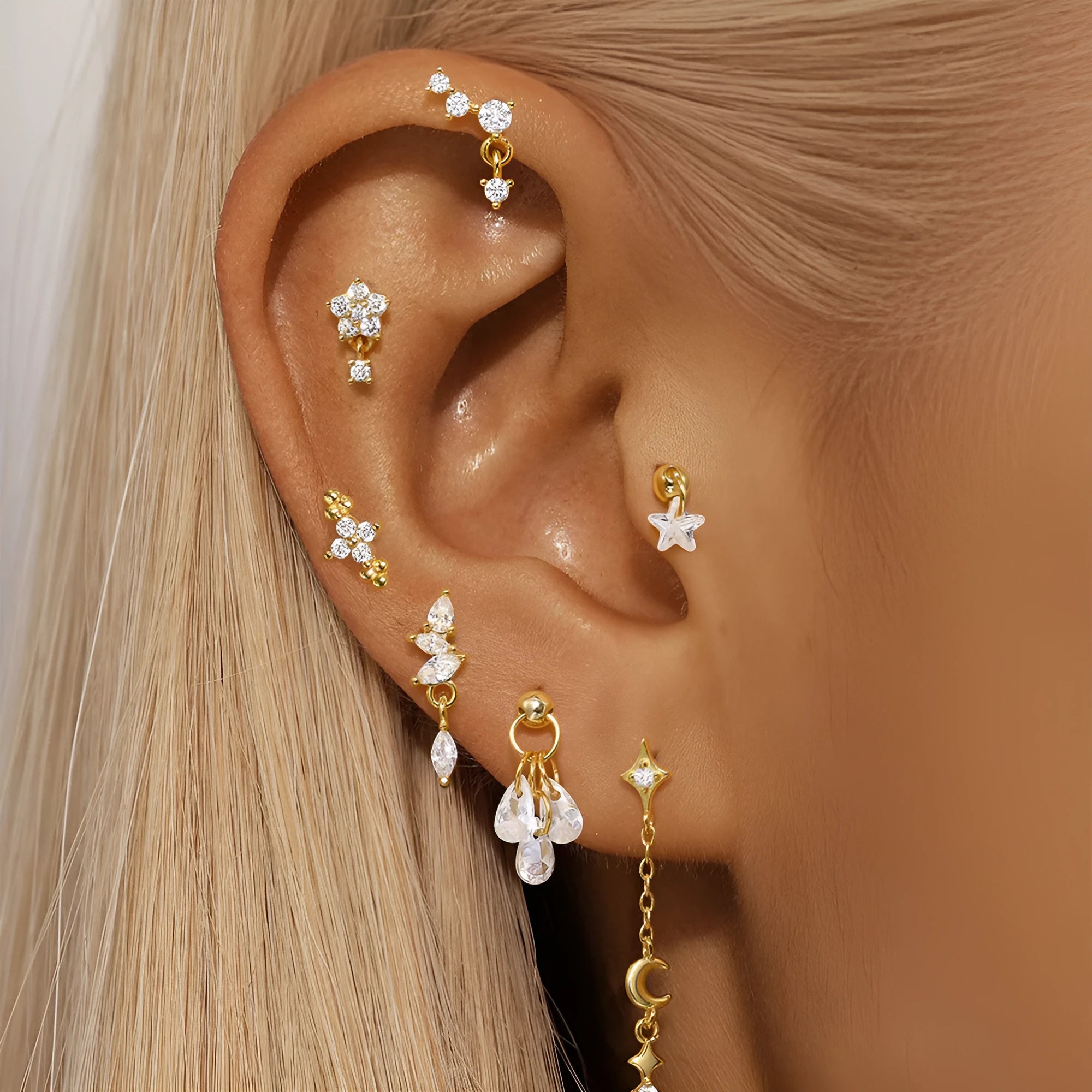 S925 sterling silver moon and star earrings with embedded diamond details in gold-plated finish