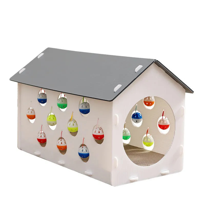 Plastic cat scratch board house with integrated tunnel containing bell ball and nest bed area