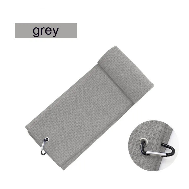 Waffle-textured golf ball cleaning cloth showing weave pattern in blue colour