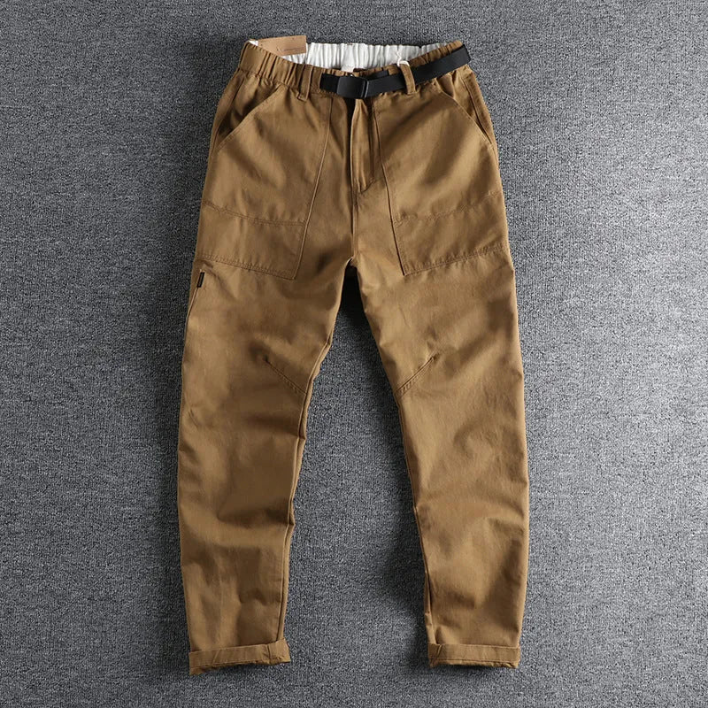 Men's cotton work trousers with buckle belt in khaki colour showing three-dimensional cutting