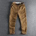 Men's cotton work trousers with buckle belt in khaki colour showing three-dimensional cutting