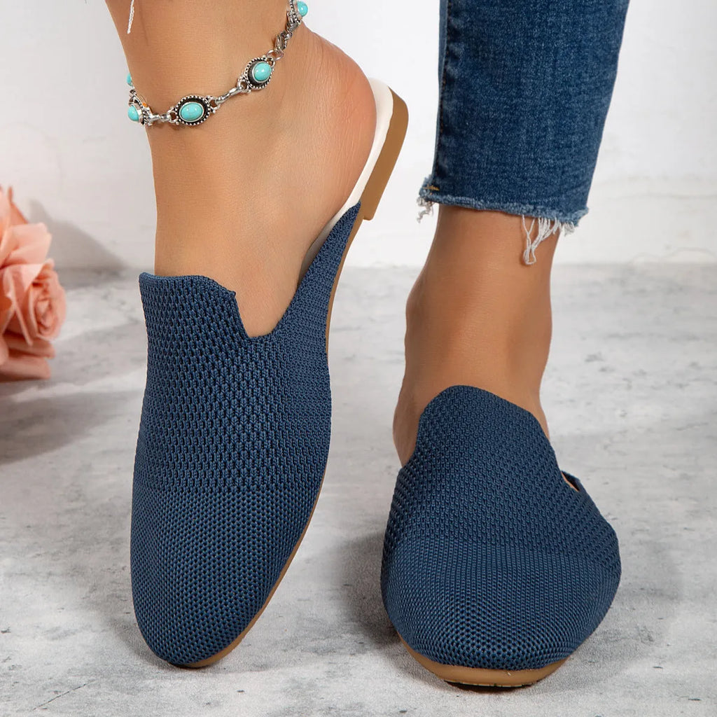 Mesh slip-on sandals in apricot, blue, and green with a cloth upper and flat rubber sole.