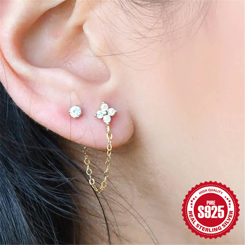 S925 sterling silver ear studs with a diamond flower, tassel, and chain design in a golden electroplated finish.
