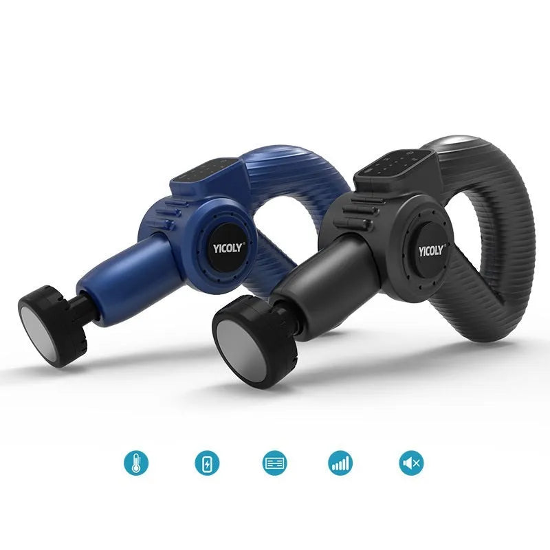 Black smart muscle massage gun with five attached massage heads on a table