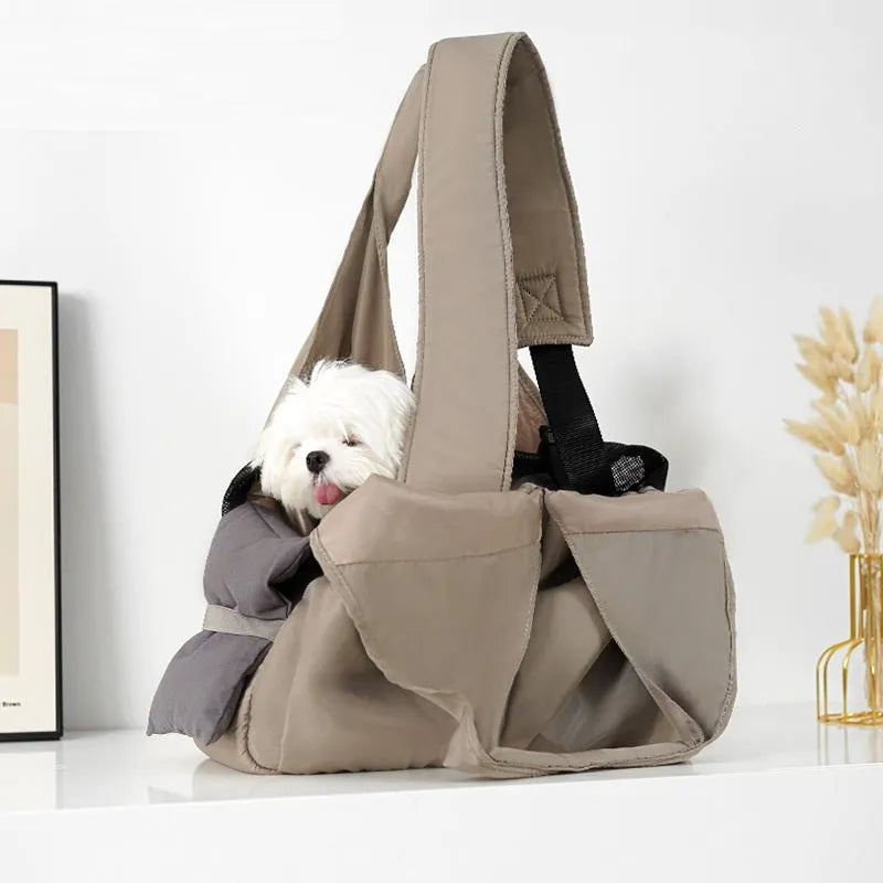 Apricot-coloured cloth pet carrier handbag for outdoor use with small pets.