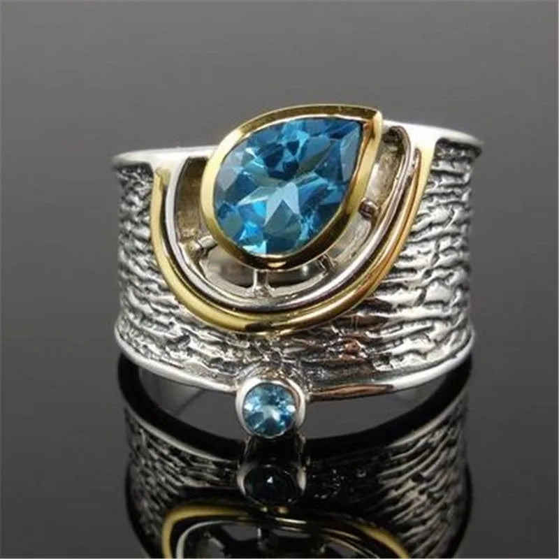 Chinese style women's blue zircon ring with drop shape design and inlaid rhinestones