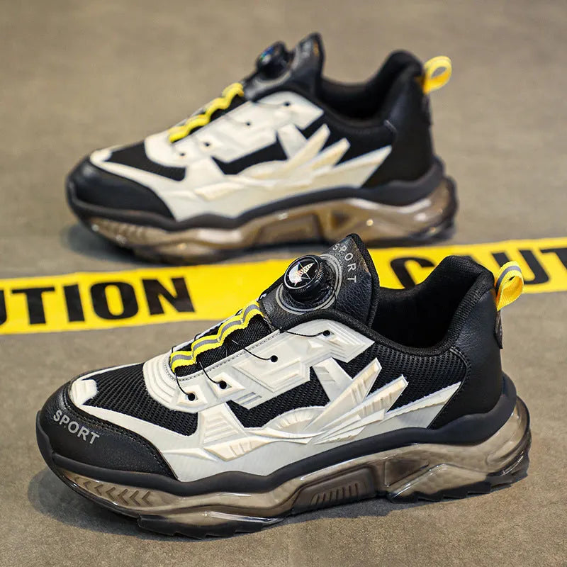 Men's black rotating button dad shoes with mesh upper and platform sole on a white background
