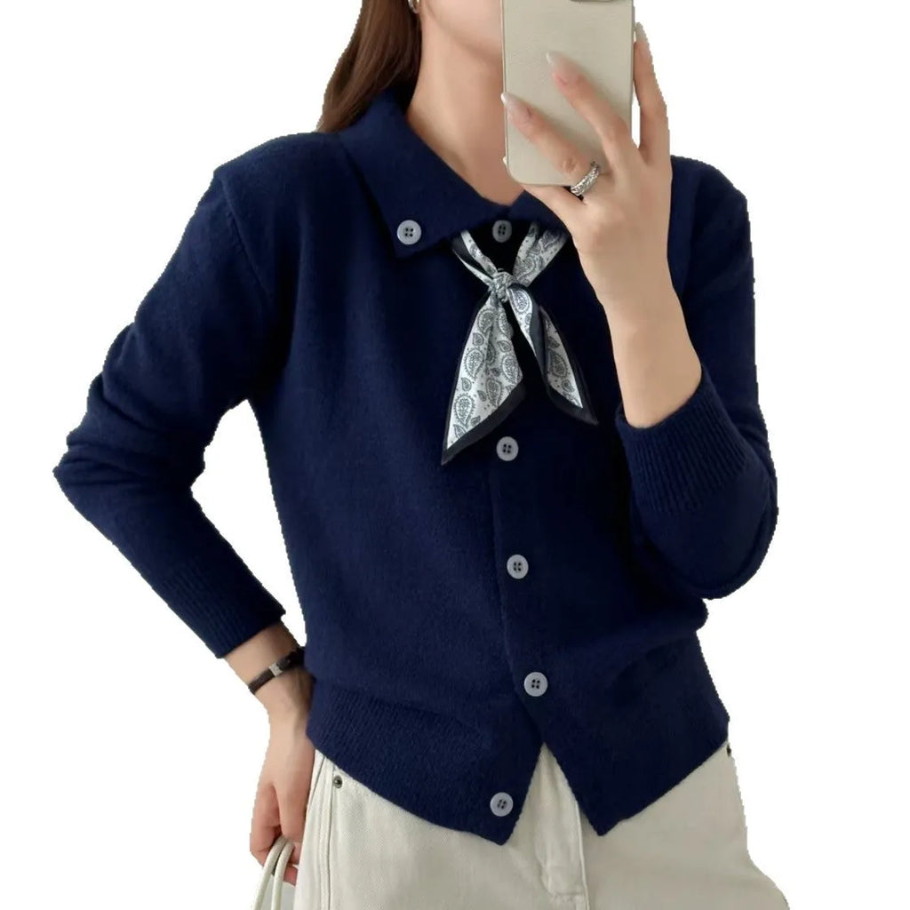 Beige lapel scarf collar cardigan sweater with long sleeves on a hanger