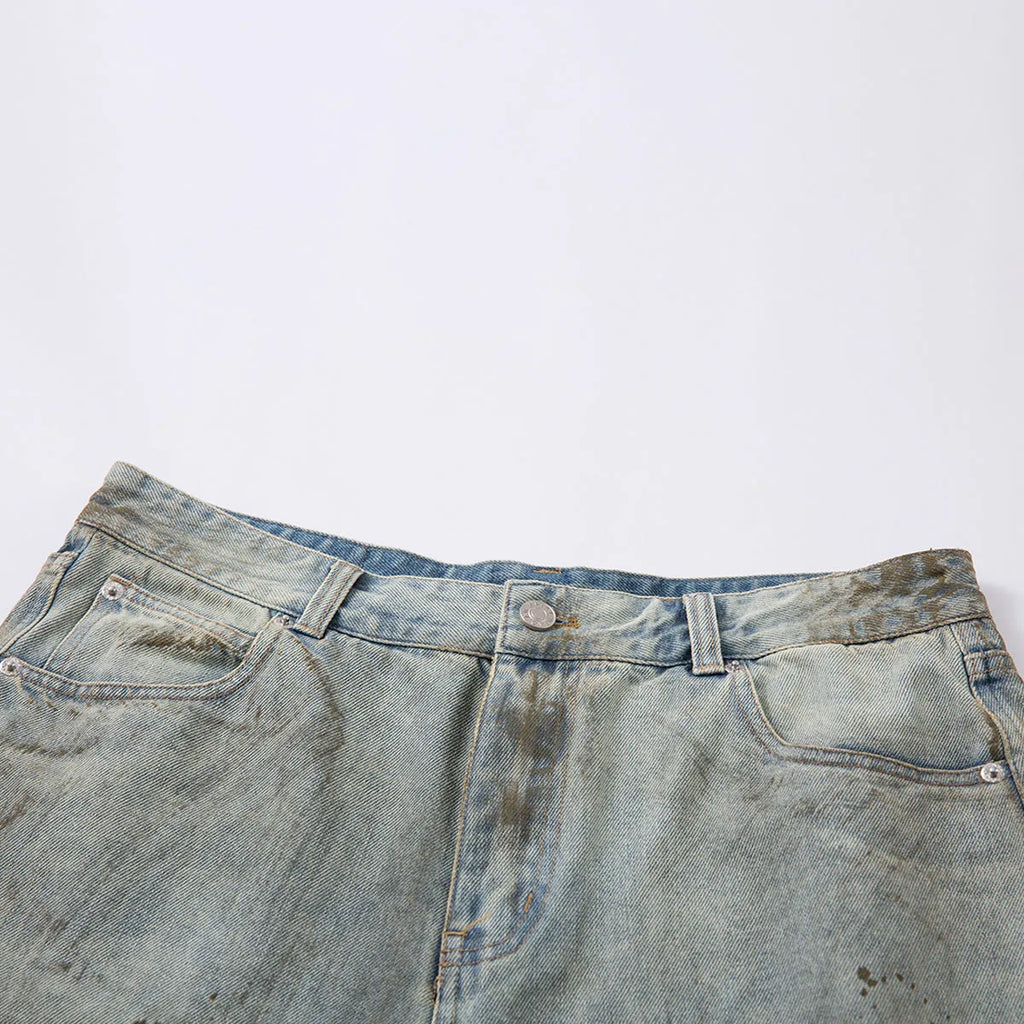 Straight-leg washed blue denim trousers with zipper fly and cropped middle pants length