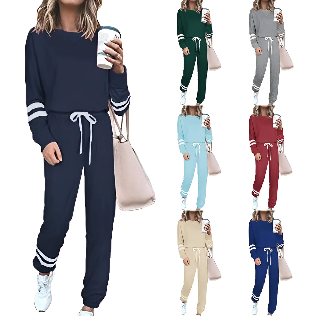Women's plus size loose-fitting casual suit in a solid colour with long sleeves and matching trousers.