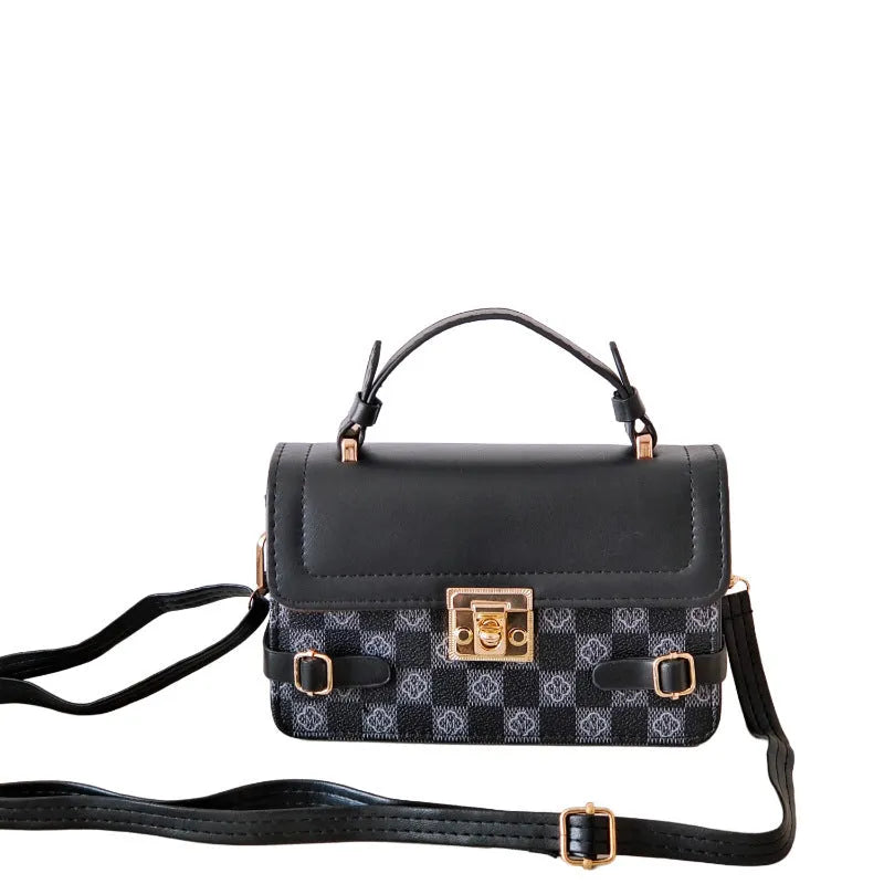 Small square retro pattern crossbody bag in PU leather with floral stitching.