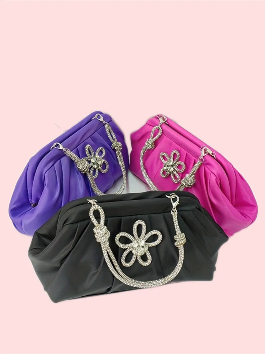 Women's soft shell-shaped polyester messenger bag in black with decorative chain and diamond details