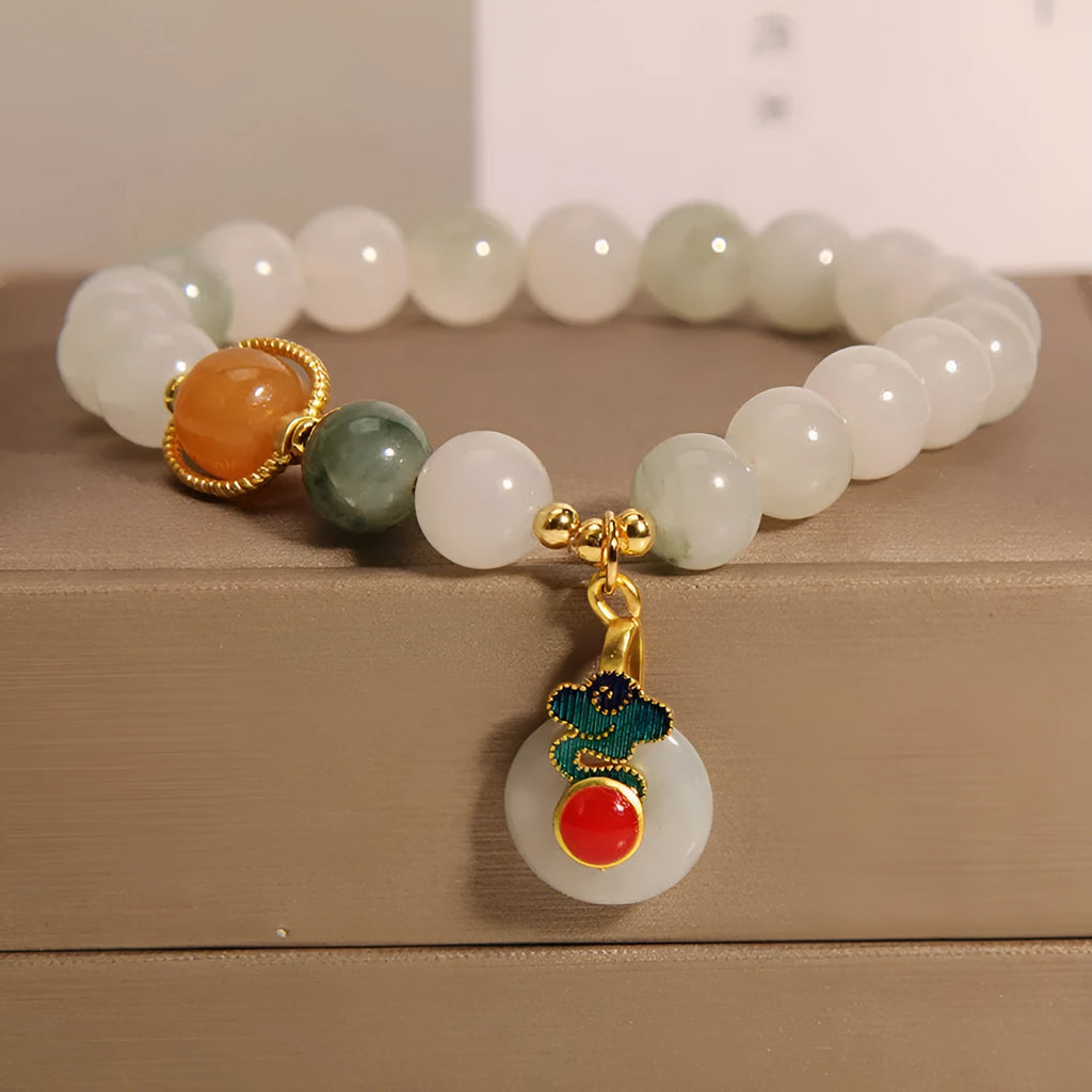 Women's ice jade crystal bracelet with pearl accents and a jade buckle on a retro design.