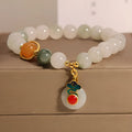 Women's ice jade crystal bracelet with pearl accents and a jade buckle on a retro design.