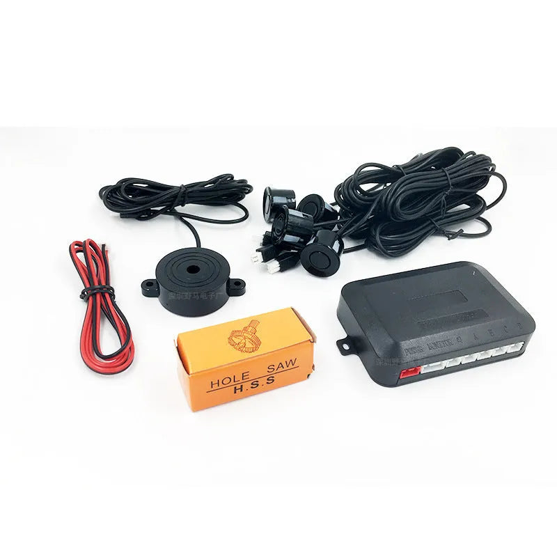 Four ultrasonic parking sensors and a buzzer control unit for a car reversing radar system.