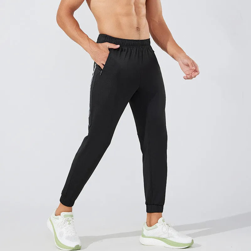 Men's black running trousers with mid waist and full length design for athletic exercise