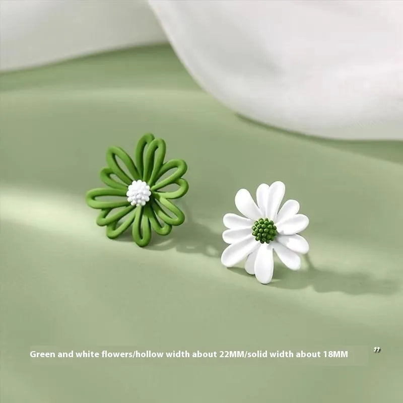 A pair of alloy cartoon flower stud earrings in blue and orange two-tone colours.