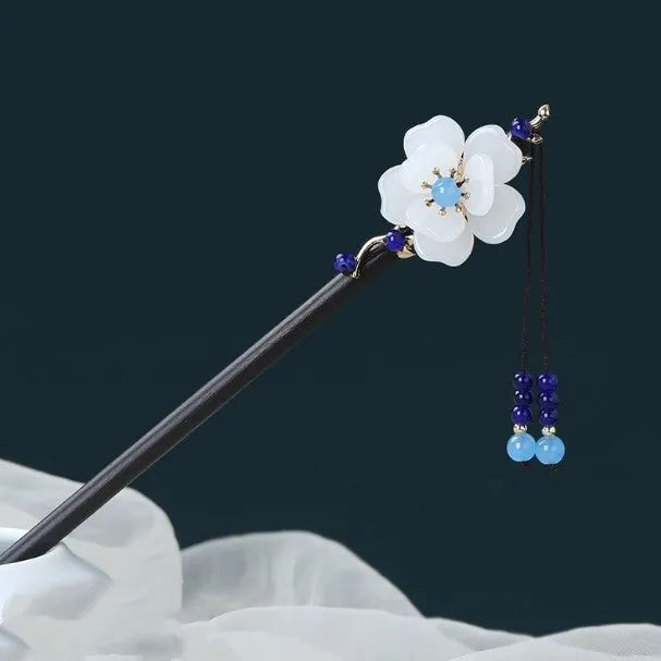 Chinese ancient style floral alloy hairpin with electroplated finish on dark background