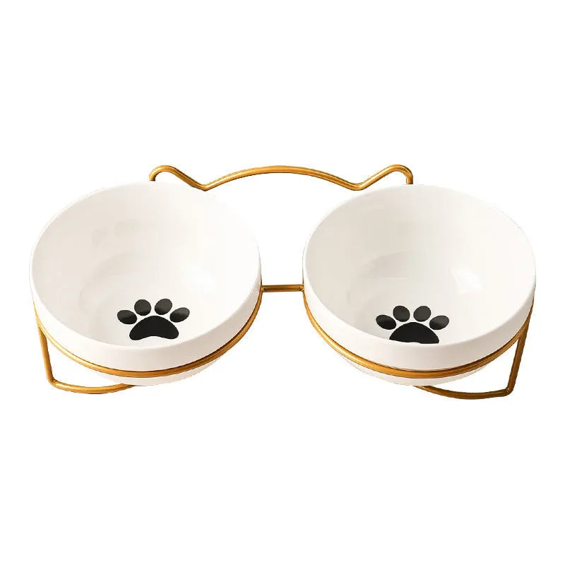 Ceramic cat bowl with iron frame in cat paw or fishbone print