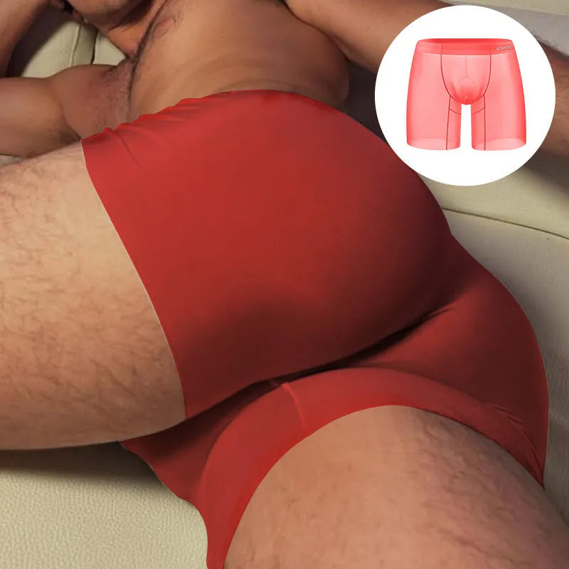 Men's seamless nylon boxers in orange, pink, and red colours on a white background