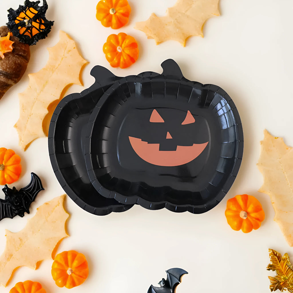 Black Halloween disposable paper plates with pumpkin design in 9-inch size