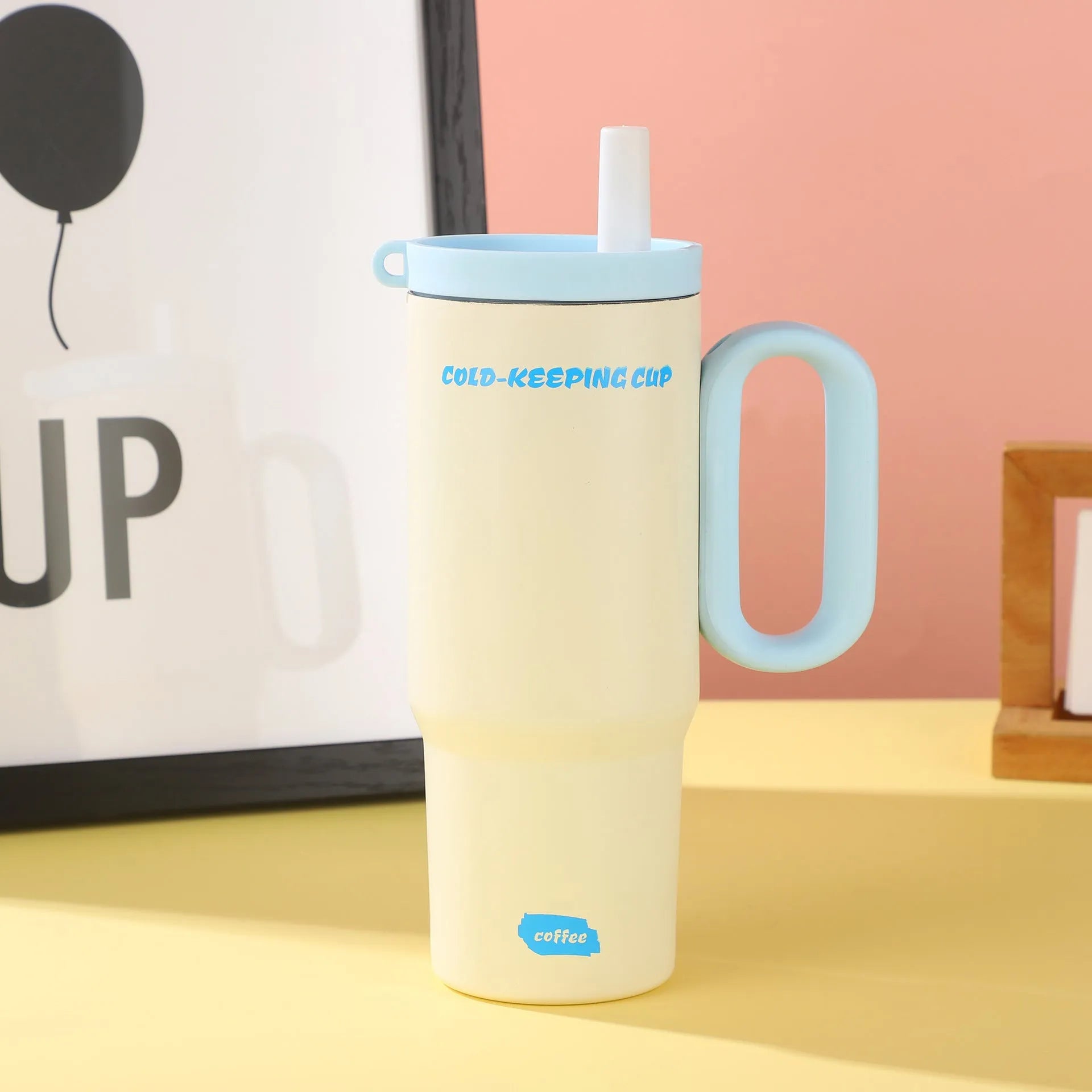 Large insulated straw cup with handle in multiple colour options showing temperature retention features