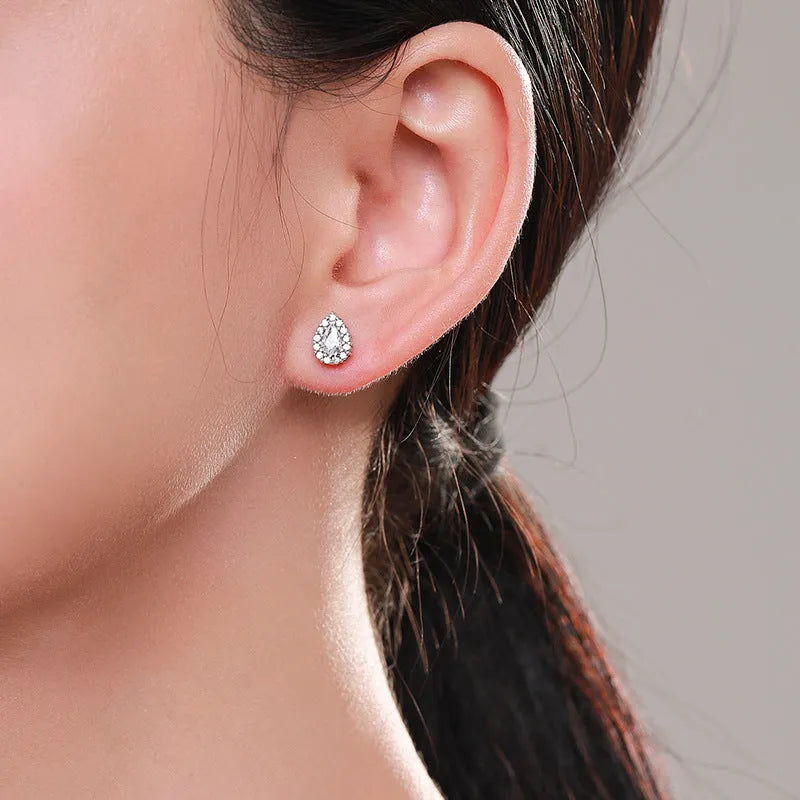 Women's silver water drop ear studs with diamond-cut surface on 925 sterling silver